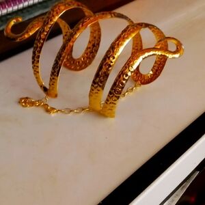 Elegant Gold Cuff Bracelet made from a soft metal